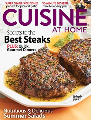 Cuisine At Home magazine cover shot of grilled rib-eye steak on a plate.